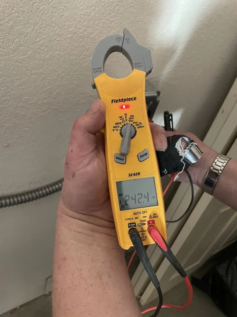 Voltage testing with clamp meter during Hot Tub / Pool Electrical Wiring in Rochelle Park